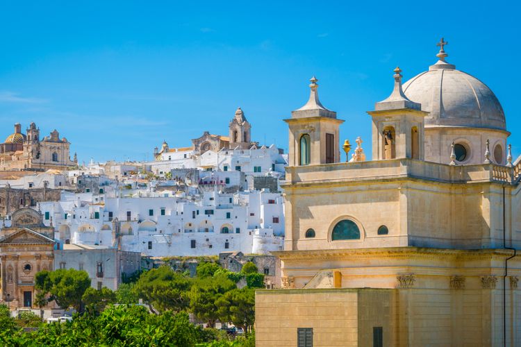 ostuni: the whitewashed city with its landscape and  golden beaches became so popular
